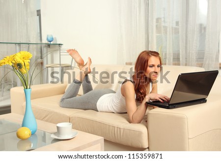 cute young woman with laptop