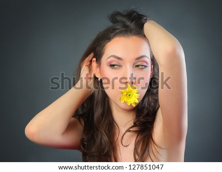 funny young woman with flower