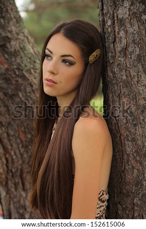 beautiful mysterious woman in forest