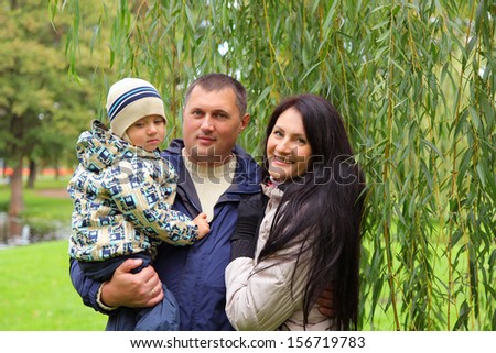 happy young family in park
