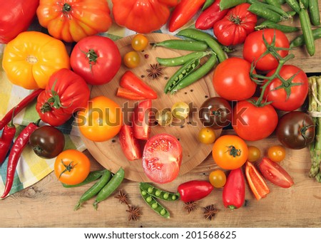 Ripe vegetables on wooden table