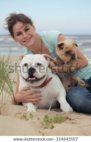 beautiful young woman with dogs