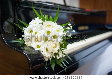 bridal bouquet on the piano