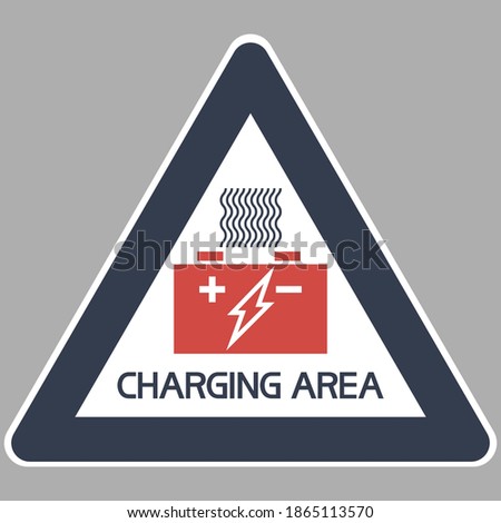 Battery charging area.
Triangular sign with textual information, two-color, flat image.
