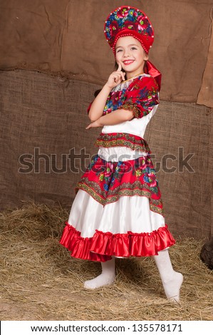 Young Girl In Russian National Costume Dancing To The Music Stock Photo ...