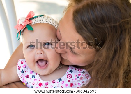 children, people, infancy and age concept - beautiful happy baby over