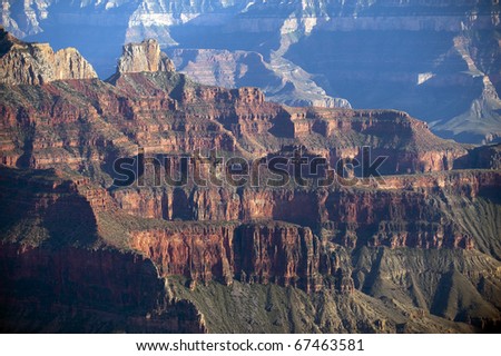 High cliffs above Bright Angel canyon, major tributary of the Grand Canyon, Arizona, USA.  View from the north rim.