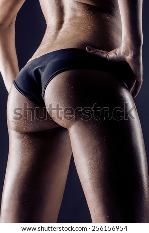 Closeup of black woman buttocks in underwear - Stock Photo