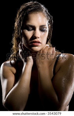 Beautiful girl in shower showing emotions