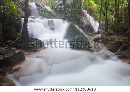 The beautiful  Phasawan waterfall  in rain season located in deep rain forest jungle at Kanchanaburi , Thailand