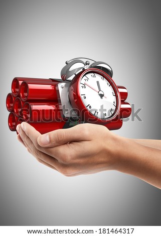 Man hand holding object ( Bomb with clock timer )  High resolution