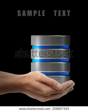 Hard disk and database. Man hand holding object  isolated on black background. High resolution