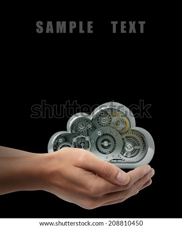 metallic cloud with gears box. Man hand holding object  isolated on black background. High resolution