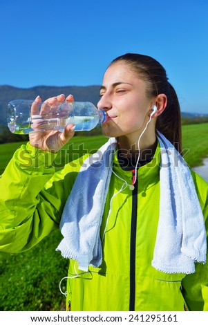 Running woman. Female runner jogging during outdoor workout