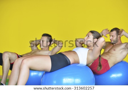 Group of people in a class of Pilates at the gym