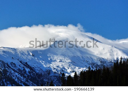 Snow filled mountain peaks in late spring.Retezat mountain