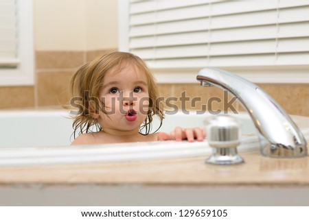 Toddler girl giving expression that needs hot water to take her bath
