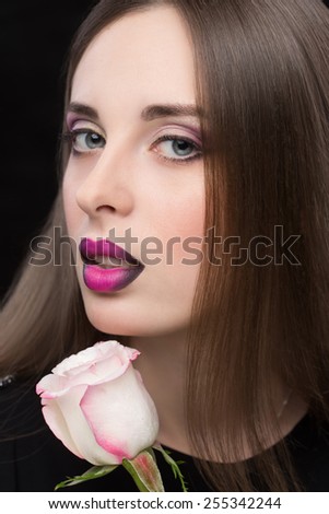 Woman face with lilac Lips and Rose Flower.