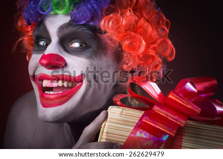 scary clown makeup and with a terrible gift
