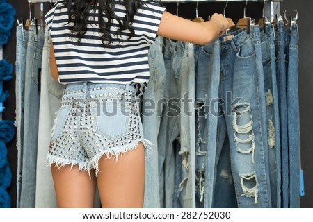 girl in short denim shorts.