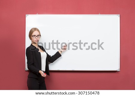 Business girl shows forefinger hand on the blank banner