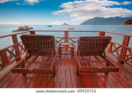 Two beach beds on a terrace with beautiful sea view