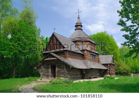 Wooden Ukrainian rural Orthodox church in the woods, Folk Arts museum, Pirogovo, Kiev, Ukraine