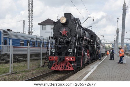 RUSSIA; ROSTOV-ON-DON - MAY 31 - The locomotive is serviced by a brigade of machinists on May 31,2015 in Rostov-on-Don