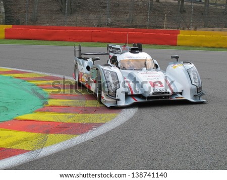 SPA-FRANCORCHAMPS, BELGIUM - MAY 2: An Audi R18 e-tron quattro race car in the La Source hairpin during round 2 of the FIA World Endurance Championship on May 2, 2013 in Spa-Francorchamps, Belgium.