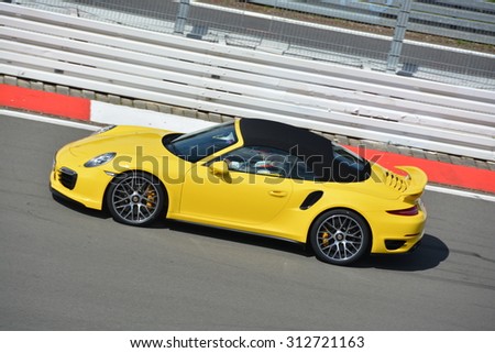 NURBURG, GERMANY - AUGUST 29: Swiss race car driver Neel Jani driving a Porsche for the VIP hot laps during round 4 of the FIA World Endurance Championship on August 29, 2015 at Nurburg, Germany.