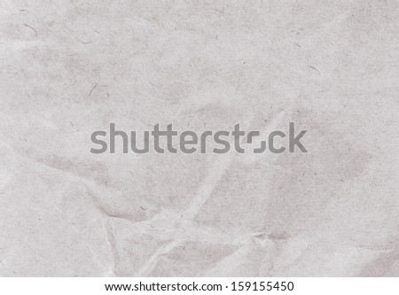 Crumpled  recycled paper  background texture. Vintage craft paper texture light grey  color. Paper for package.