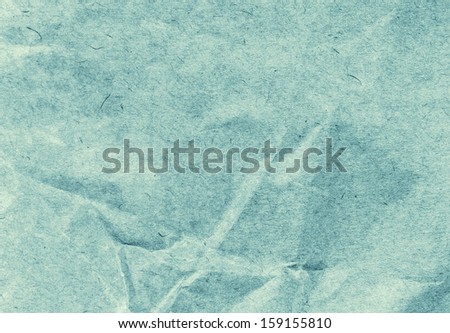 Crumpled  recycled paper  background texture. Vintage craft paper texture green  tonning color. Paper for package.