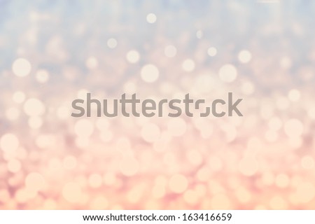 Abstract twinkled bright background with bokeh defocused blur lights. Festive Sparkle Background.