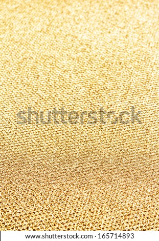 Elegant Gold  background with Glittering magic effect. Golden textured festive background for party, holidays, events and Christmas.