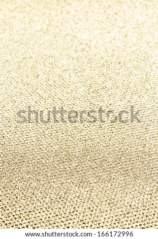 Bright  Gold  background with Glittering magic effect. Golden textured festive background for party, holidays, events and Christmas.