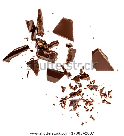 Flying Dark chocolate pieces isolated on white background.  Chocolate bar chunks, shavings and cocoa crumbs Top view. Flat lay Stock fotó © 