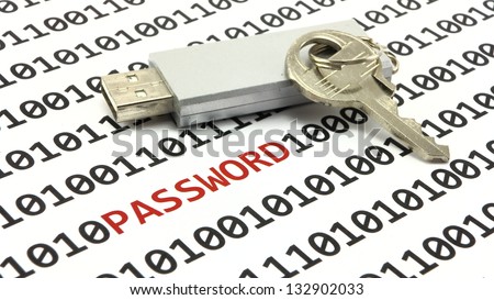 Conceptual image of red password letters amongst binary numbers with a memory stick and silver key to symbolize computer and internet security