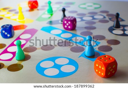 Fun board game with color pawns slot and dice for several people.