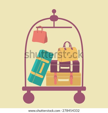 luggage cart with suitcases and bags