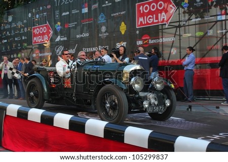 BRESCIA ITALY - MAY 17: dark green Bentley 4.5 litres supercharged built in 1929  driven by R. Charlesworth starts the 1000 Miglia 2012, on May 17, 2012 in Brescia