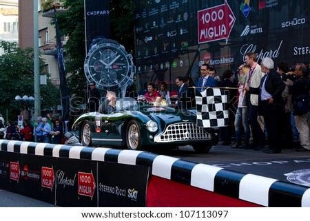 BRESCIA ITALY - MAY 17: Green 1951 Aston Martin DB3 driven by U. Monti starts the 1000 Miglia 2012, on May 17, 2012 in Brescia