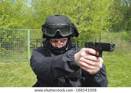 Special unit policeman with a gun