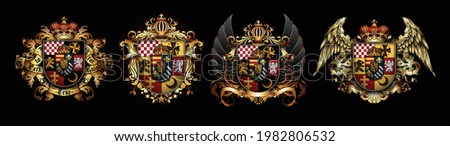 Set of heraldic shields with a crown and wings  on a black background. High detailed realistic illustration