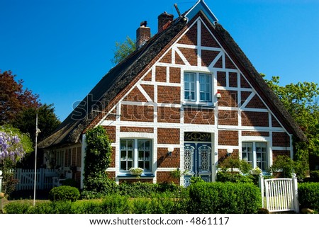 Old gable of a thatched cottage in northern Germany