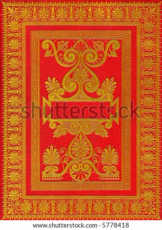 Old ancient red book cover with ornaments from 1885 with golden ornaments