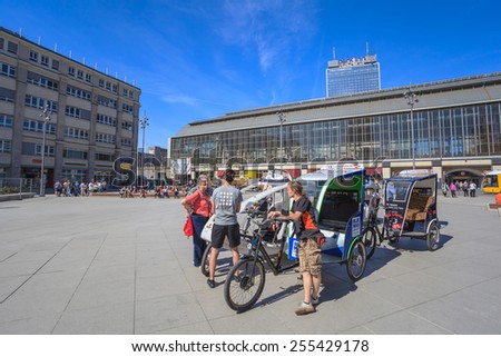 BERLIN, GERMANY - JUNE 4 : The three wheel bicycle waiting for tourist at Alexanderplaz on June 4, 2013 in Berlin, Germany. This is popular way to travel around Berlin.
