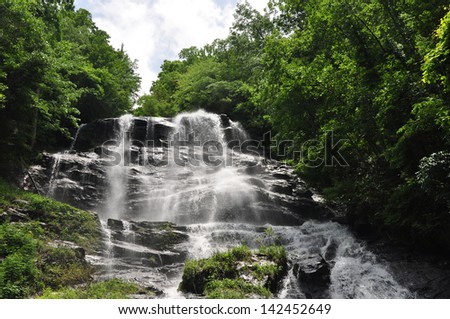 The cascading Amicalola Falls seen from the lower bridge which looks up at the 790 \' waterfall