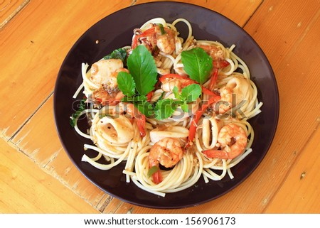 Pasta with seafood in top view