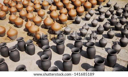BHAKTAPUR, NEPAL -JANUARY 29: The mud vase is dried in square in BHAKTAPUR on 29 Jan 2013. Bhaktapur is listed as a World Heritage by UNESCO, Mud vases is one of its local product