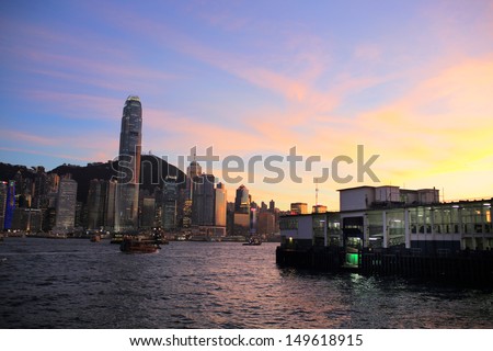 Hong Kong victoria harbour skyline in sunset glow